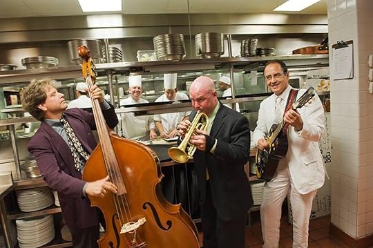 Musicians playing in a restaurant kitchen