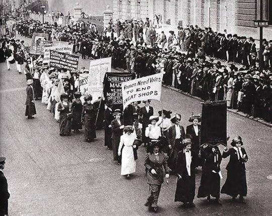 This photo shows a woman with a sign that mentions the Shirtwaist Factory, a reference to the deadly New York City fire that took the lives of 145 women seamstresses in 1911. But as early as 1908, working women were organizing and marching for better working conditions and pay, and still we’re waving signs in the streets, believing a better world with women’s say-so is not only possible, but essential.