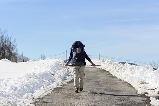 pilgrim in winter with snow in St. James Way