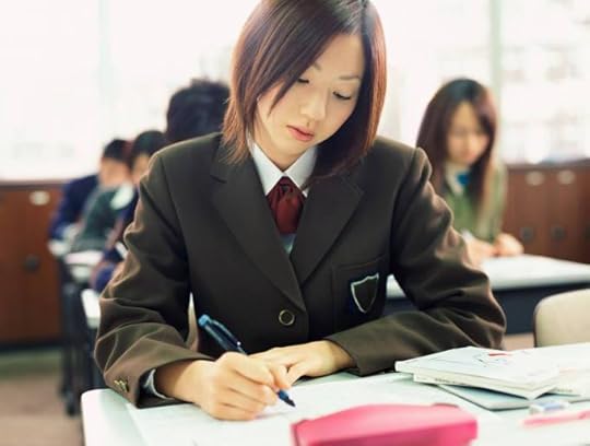 Schoolgirl Working in a Classroom