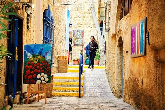 Tourists visiting unique art galleries found at narrow streets Old Jaffa, Tel Aviv, Israel