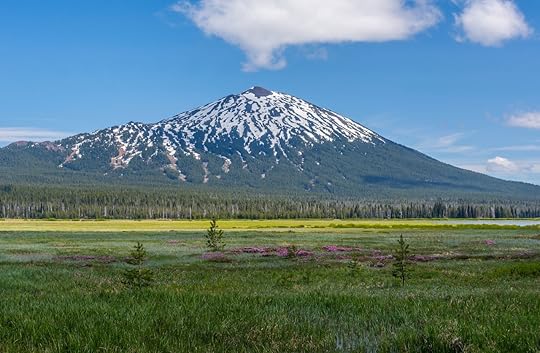 Mount Bachelor photographed in late spring from across the lake at Sparks Lake, one of the lakes on Cascade Lakes Scenic Byway near Bend, Oregon