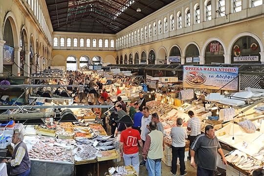 Fishmongers and seafood stalls in a food market in Athens