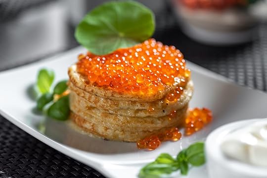 Russian style pancakes with caviar
