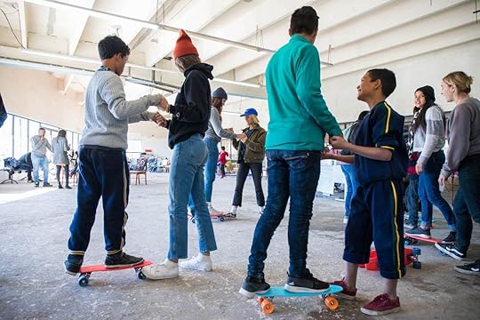 Mexican migrant kids learning to skateboard