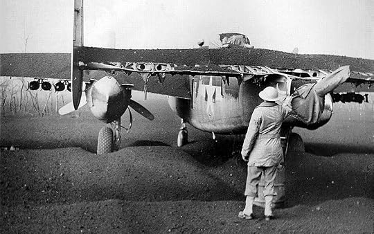 B-25 of the US 340th Bombardment Group at Pompeii Airfield, covered with volcanic ash from the eruption of Mount Vesuvius, 23 March 1944 (USAF Photo)