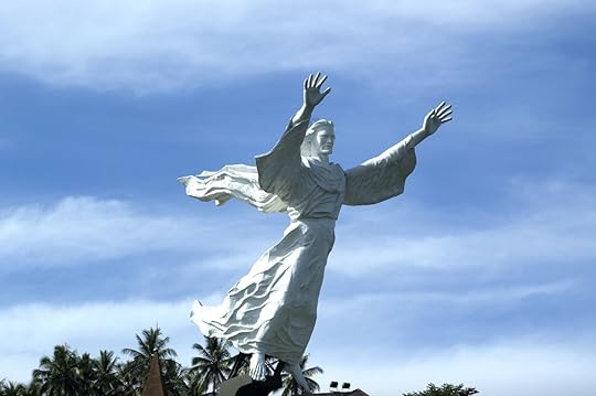 White Jesus Christ statue with arms outstretched