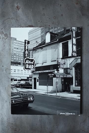 The exterior of the Russian Inn in black and white