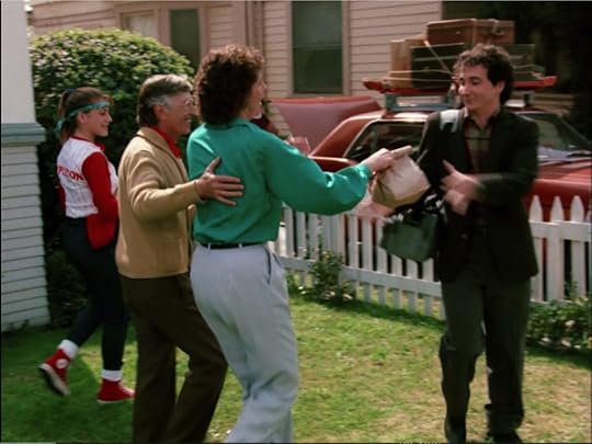 Larry's mom, I guess, hands him a sack lunch.