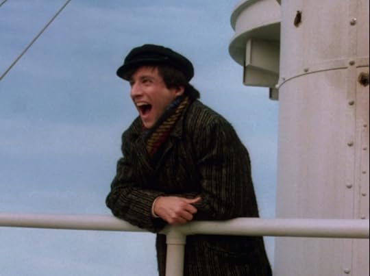 Balki, dressed in clothes that he probably inherited from my immigrant great-grandparents, standing at a ship railing, nothing but blue sky behind him.