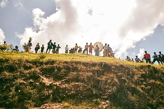 Rural Rwandans watching Tour du Rwanda bike race in the countryside