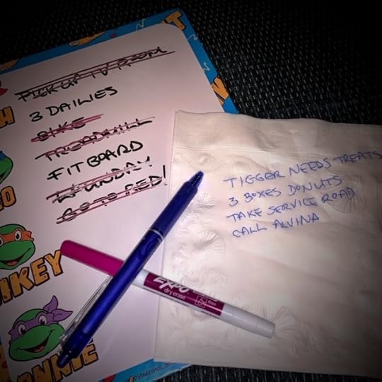 A cheap whiteboard and a list on a napkin.