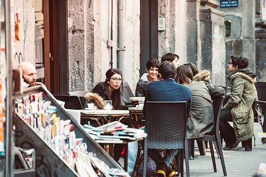 People eating at small cafe in Naples, Italy