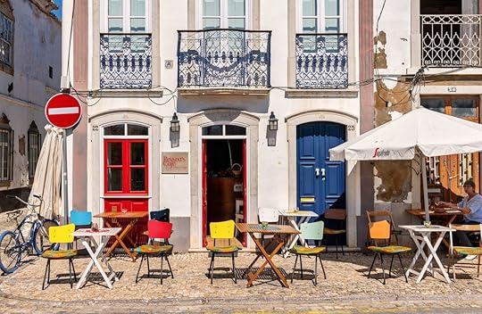 Tables outside a cafe in Tavira, Portugal