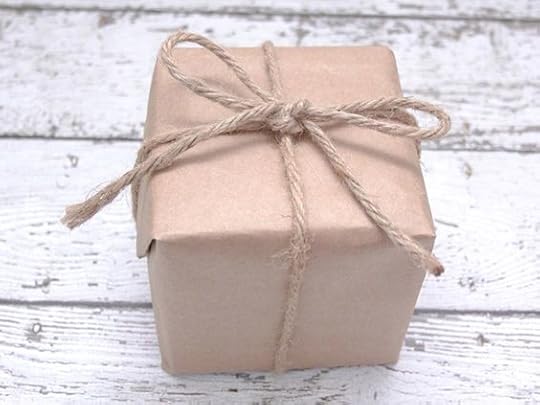 gift wrapped in brown paper and twine