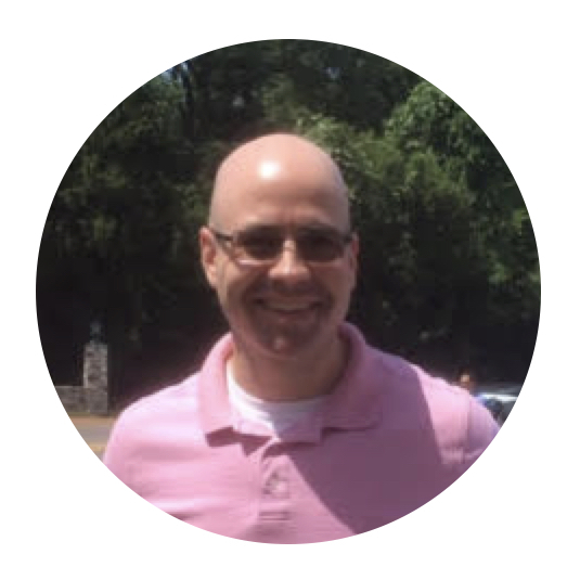 headshot_schurger round.jpg