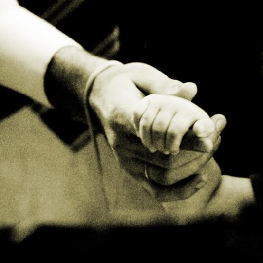 Big hand holding little hand pic