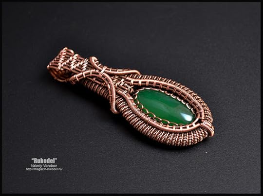 Handmade pendant from copper wire.
