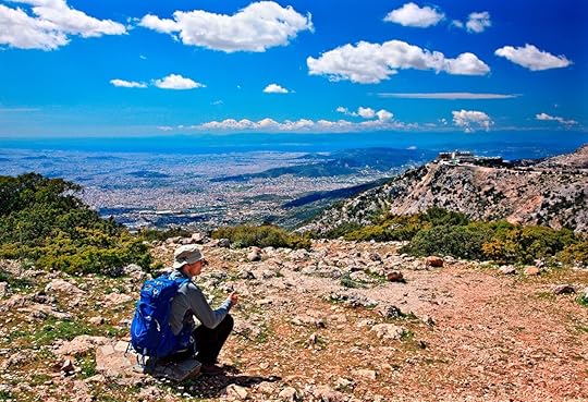 Hiker enjoying the view of Athens from Parnitha mountain