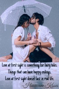 Man and woman sitting under umbrella. Both are wet.<br />Quote: Love at first sight is something for fairy tales. Things that can have happy endings. Love at first sight doesn't last in real life.