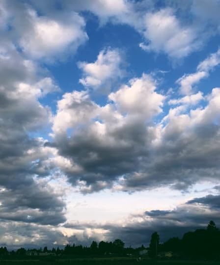 blue sky with backlit clouds