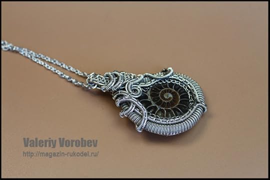 Wire Wrap Pendant. Ammonite fossil slice Madagascar. Wire from nickel silver