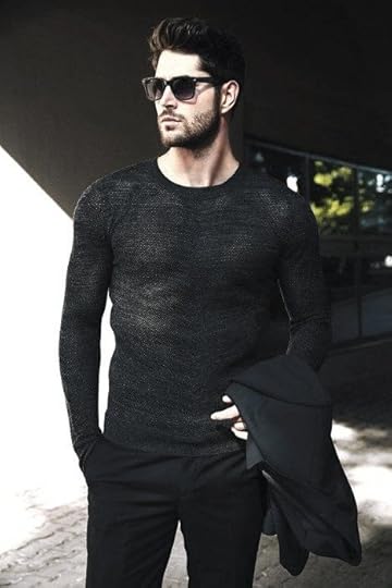 sexy man in all black suit