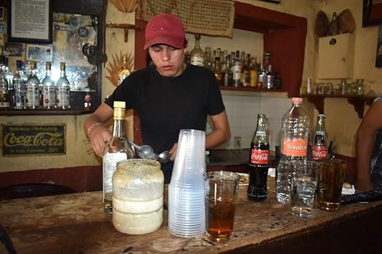 Bartender making a drink at La Capilla