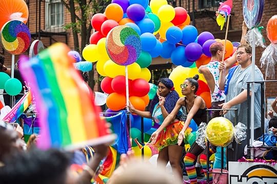 Colorful float at NYC Pride Parade as it passes through Greenwich Village