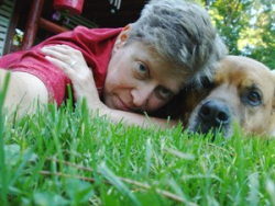 Ariel on grond with dog