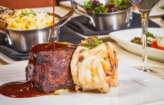 surf and turf dish with sauce and sides