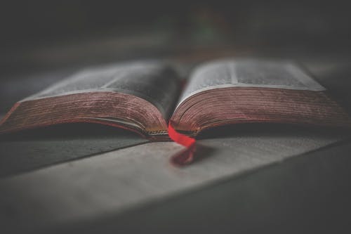 Free Close-up Photo of an Opened Religious Book Stock Photo