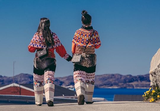 Greenland Nuuk Fjord women holding hands in traditional dress