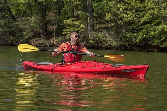 Guy kayaking in Greensboro