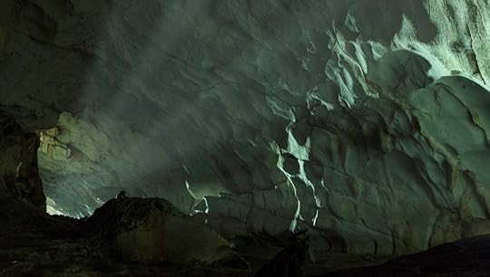 Sun rays entering cave entrance