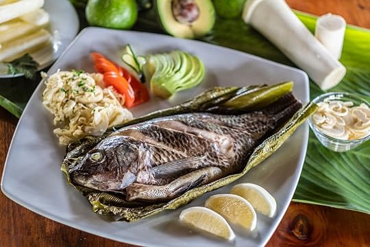 Ecuadorian Traditional Dish Maito de Pescado, fish wrapped in banana leaves
