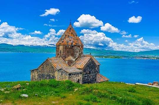 Church of Sevanavank Monastery with the Sevan Lake and snowy mountains on the background, Sevan, Armenia