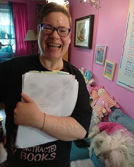 I just finished the edit of my manuscript based on feedback from my agent! At least on paper. Now I have to type up all the new scenes, rewritten scenes, and threads that I have throughout the manuscript. Then I will print it all out and read through it once more to make sure that all the threads and timeline make sense, that I like everything that I’ve added, and that I haven’t introduced any errors. Then it goes out to my fabulous agent Jennifer Wills (unless I send it at the typed stage). I finished the edit today wearing this gorgeous book T-shirt: Easily Distracted By Books, a gift from Lynn Postlewait, and of course with the company of my sweet little Petal. And with chocolate and natural energy drinks throughout!<br /><br />I am so excited about this edit. I hope it gets published, and I hope that once it does that you are moved and gripped by it. It’s another YA psychological suspense like SCARS and STAINED, only it has even more of my own trauma and healing experience than they do. I can’t wait for the day that I can share it!<br /><br />#amediting #amwriting #yabooks<br />#cherylrainfield #YAwriter #LGBTQwriter #booknerd #bookworm #ireadYA #survivor #feminist #YAlit #iwriteya