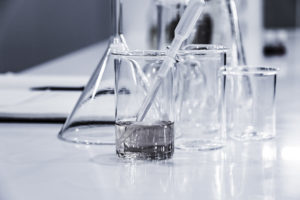 Image of clear beakers and other chemical equipment