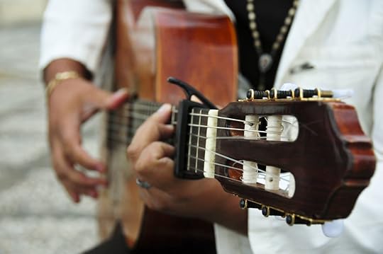 Man playing the Spanish guitar