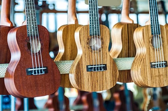 Ukuleles hanging up in a shop