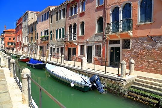 Small boats on a canal in Dorsoduro Quarter, Venice, Italy