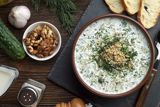 Homemade chilled tarator with nuts on wooden rustic background