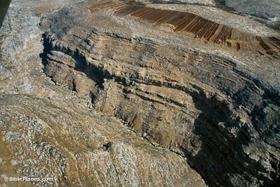 An image of the cliffs near Michmash, from https://www.bibleplaces.com/michmash/