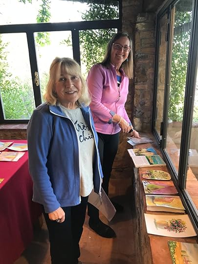Helena, right, and Patricia assess our paintings. 
