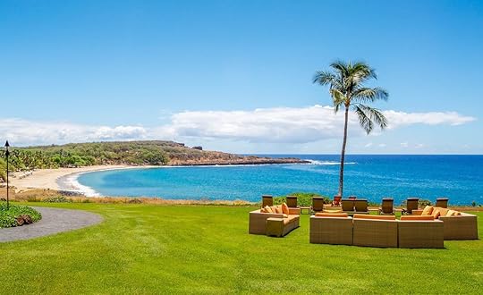 Pacific waves splash into black and white pools in Lanai, Hawaii