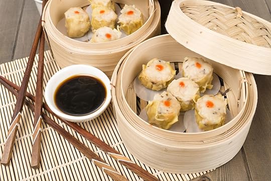 Chinese steamed pork dumplings in bamboo steamers