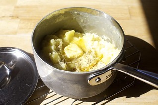 add butter and seasoning and mash