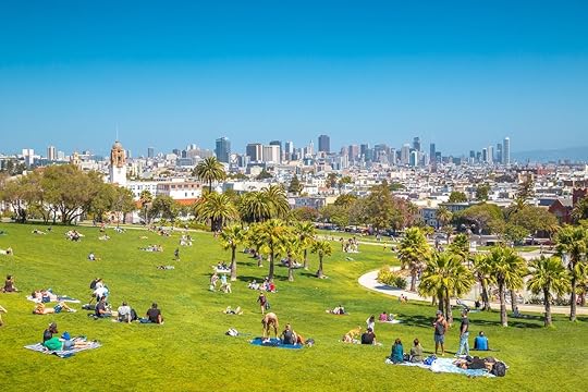 People enjoying the sunny weather in Mission Dolores park