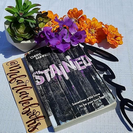 I LOVE this gorgeous photo that fellow #YAlit author @mcfarlanebooks took of STAINED, and that she’s enjoying it so far. It’s always such a compliment when other writers like your work. Melanie has such a great artistic eye – AND she also writes dark fiction with hope. Check out her books if you haven’t already. <br />Via @mcfarlanebooks – What are you reading right now? My current #tbr is Stained by @cherylrainfield and it’s amazing 